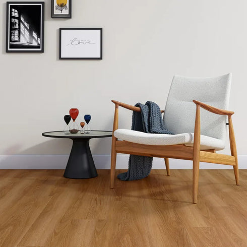 Amtico Click Smart Summer Oak Flooring – A warm-toned oak luxury vinyl plank with natural grain detailing, offering a timeless and versatile finish. Waterproof and easy to maintain. LuxeFloors Co.
