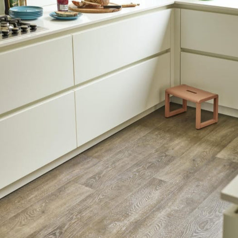 Amtico Spacia Heritage Oak flooring detail, highlighting realistic wood textures and deep, natural grain. A high-performance LVT perfect for kitchens, bathrooms, and living spaces. LuxeFloors Co.
