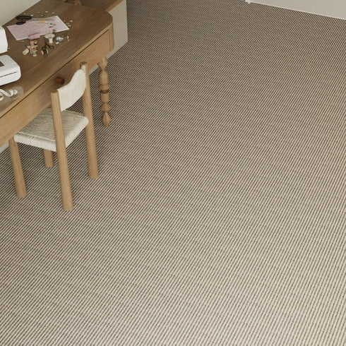 ITC Delta carpet in beige, enhancing a minimalist space with vintage sophistication and a soft, elegant foundation.