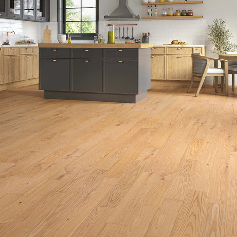 LuxeFloors Co.’s Chiswick Engineered Oak flooring installed in a stylish kitchen, enhancing the space with its warm tones and premium European oak craftsmanship.