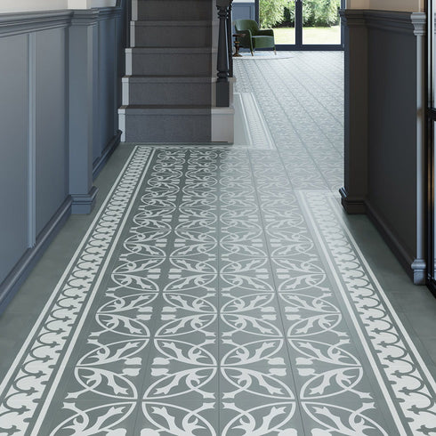 A beautifully designed hallway with Invictus LVT Victorian Treasure Smoke flooring, offering a seamless flow with intricate heritage detailing and a sophisticated neutral palette.