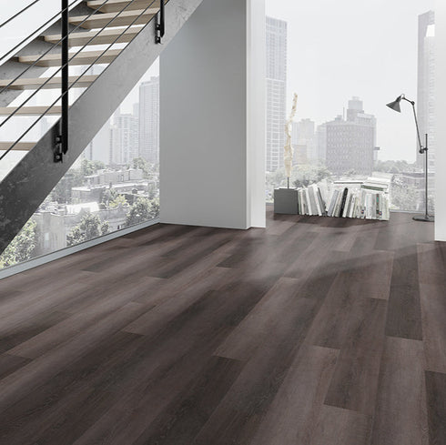 Endura 70 luxury vinyl tile in a modern office overlooking a skyline in the city.