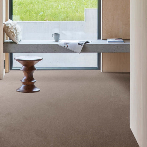 Luxurious and eco-friendly GAIA® Indus 40 carpet in a sophisticated warm taupe, made from 100% recycled polyester for softness, durability, and sustainable living.