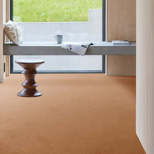 Luxurious and sustainable GAIA® Indus 82 carpet in a rich, earthy tone, crafted from 100% recycled polyester for superior softness, durability, and eco-conscious living.