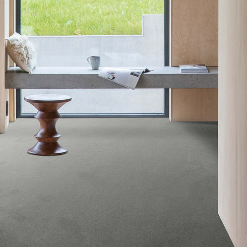 GAIA® Indus 98 carpet in a sophisticated dark grey shade, made from 100% recycled polyester, offering a perfect blend of elegance, durability, and sustainability.