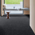 GAIA® Indus 99 carpet in a rich anthracite tone, crafted from 100% recycled polyester, combining modern style, durability, and eco-conscious design.