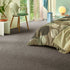 Contemporary Sedna® Kai carpet in a soft brown-grey, blending sustainability with timeless style.