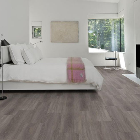 Kährs Wentwood luxury vinyl flooring featuring a soft beige oak appearance with subtle grain variations, enhancing airy and light-filled interiors.