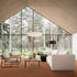 Lano Lior carpet in rust, adding warmth and sophistication to a modern eco-friendly conservatory with a simple, elegant interior design.