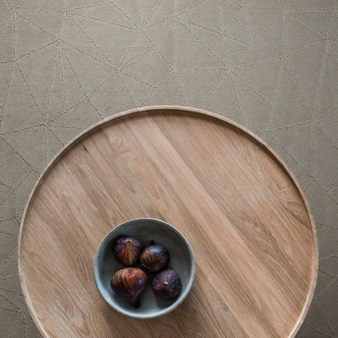 Bird’s-eye view of Lano Loft Life Grand carpet in olive beige, enhancing a simple and elegant room with a warm, natural aesthetic.