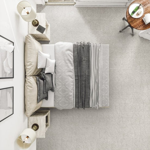 Bird’s-eye view of Lano Loft Life Grand carpet in light grey off-white, adding a soft and elegant touch to a minimalist master bedroom with a serene ambiance.