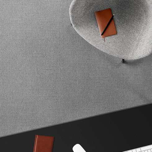 Lano Loft Life Pure carpet in grey, complementing a sleek and modern workspace with a minimalist aesthetic and stylish decor.