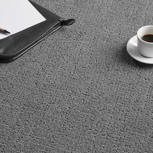 A close-up of the Charcoal Loft Life Sweet SmartStrand carpet by Lano. Showcasing its rich texture, superior stain resistance, and ultra-soft feel for long-lasting performance.