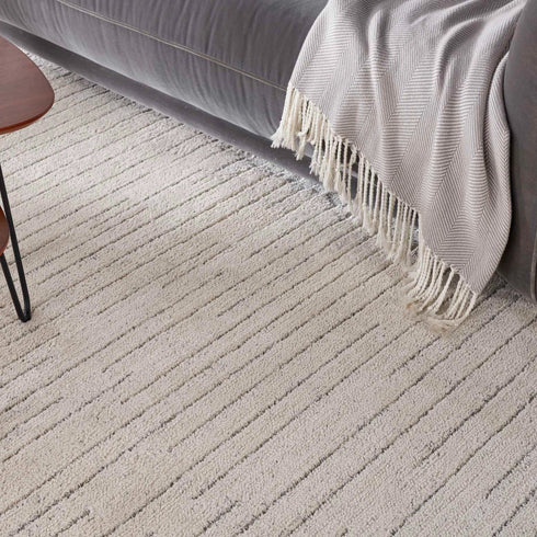 Close-up of Nourison Andes Ridge Carpet in Ivory, showcasing its soft, plush texture and sophisticated design.