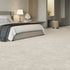Luxurious light beige iSENSE® Obsession carpet in a serene bedroom setting, adding warmth and elegance.