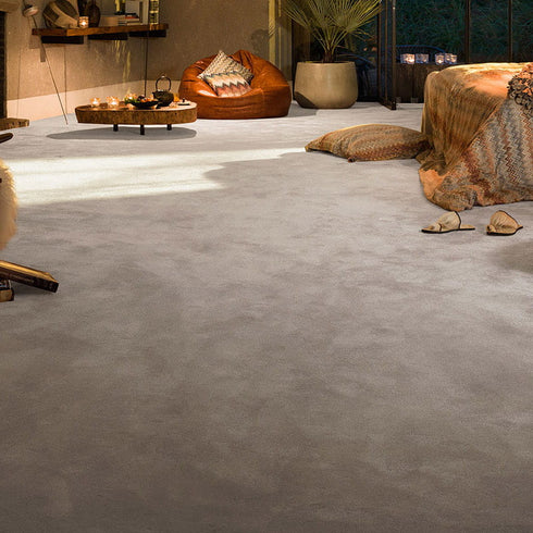 Soft grey-stone beige iSENSE® Obsession carpet in a living room, blending neutral tones for a modern and inviting atmosphere.