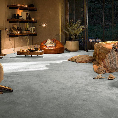 Soft light grey iSENSE® Obsession carpet with a subtle blue undertone in a living room, creating a cool yet inviting and elegant ambiance.
