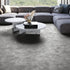 Soft cement grey iSENSE® Obsession carpet in a living room, offering a modern and elegant feel with its plush, velvety texture.