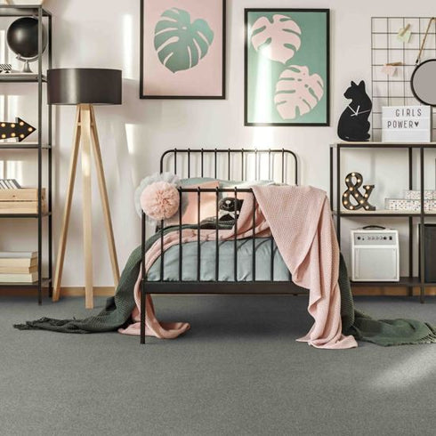 Lano Patina SmartStrand® Carpet in Moonbeam Grey - Bedroom Interior – A cozy bedroom featuring Lano Patina SmartStrand® carpet in Moonbeam Grey, complementing a soft, neutral aesthetic for modern homes.