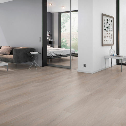 Strata - Prestige XL 55 luxury vinyl tile in a modern home, looking into the bedroom with minimal tones and design around.