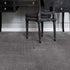 iSENSE® Surprise carpet in a cement grey tone, complementing a classic, stylish room with a vintage desk and chair.