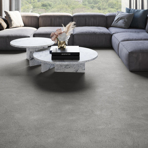 iSENSE® Subtlety carpet in a soft grey shade, adding a modern and elegant touch to a sophisticated living room setting.