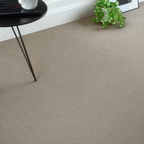 Lano Sofia carpet in beige, creating a cozy and elegant ambiance in a beautifully designed room.