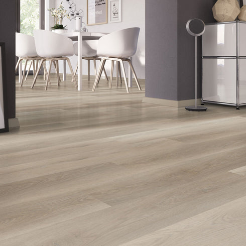 Strata Metro 30 luxury vinyl flooring in a contemporary dining space, featuring a light wood finish that enhances the open-plan design