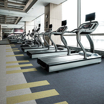Strata - Weave+ luxury vinyl tile, with unique and highly customisable designs in a gym.