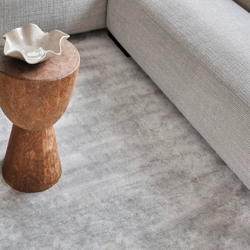 Elegant grey ITC Galaxy carpet with stone tones in a sophisticated living room, adding warmth and modern style to the space.