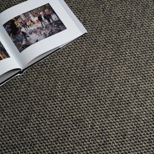 ITC Lima carpet in brown tones with green undertones, showcasing its woven flatweave texture and natural, earthy aesthetic.