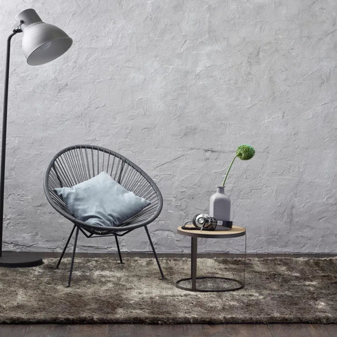 ITC Singapore rug in a brown-grey undertone, adding warmth and subtle elegance to a minimalist setting with its plush, handwoven texture.