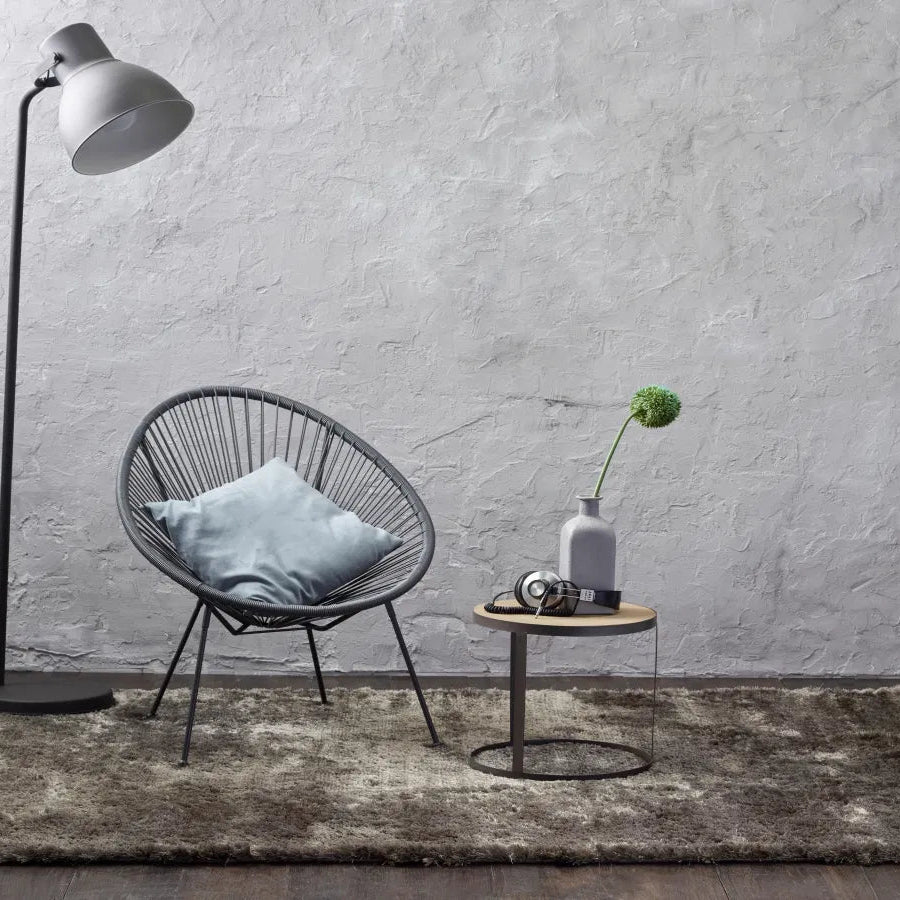 ITC Singapore rug in a brown-grey undertone, adding warmth and subtle elegance to a minimalist setting with its plush, handwoven texture.