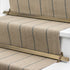 Stairrods UK Royale Vue stair rods in Antique finish, beautifully installed as a runner on a staircase, showcasing a timeless brass-toned elegance.